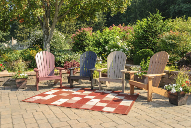 Stone patio and Adirondack chairs.